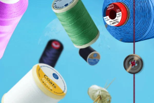 Artistic image of some of Coat's sewing cotton products